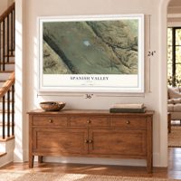 Spanish Valley, Utah map, 24 x 36 inch print in a white frame above a dresser by a staircase