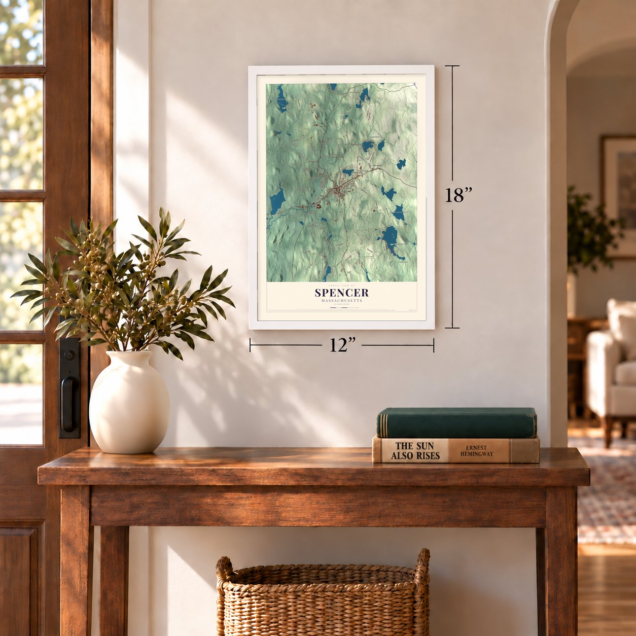 Spencer, Massachusetts map, 12 x 18 inch print in a white frame in an entryway