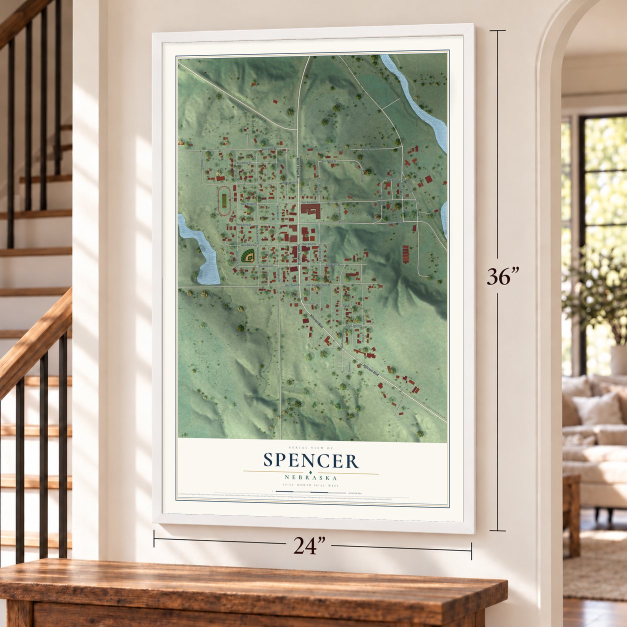Spencer, Nebraska map, 24 x 36 inch print in a white frame by a staircase