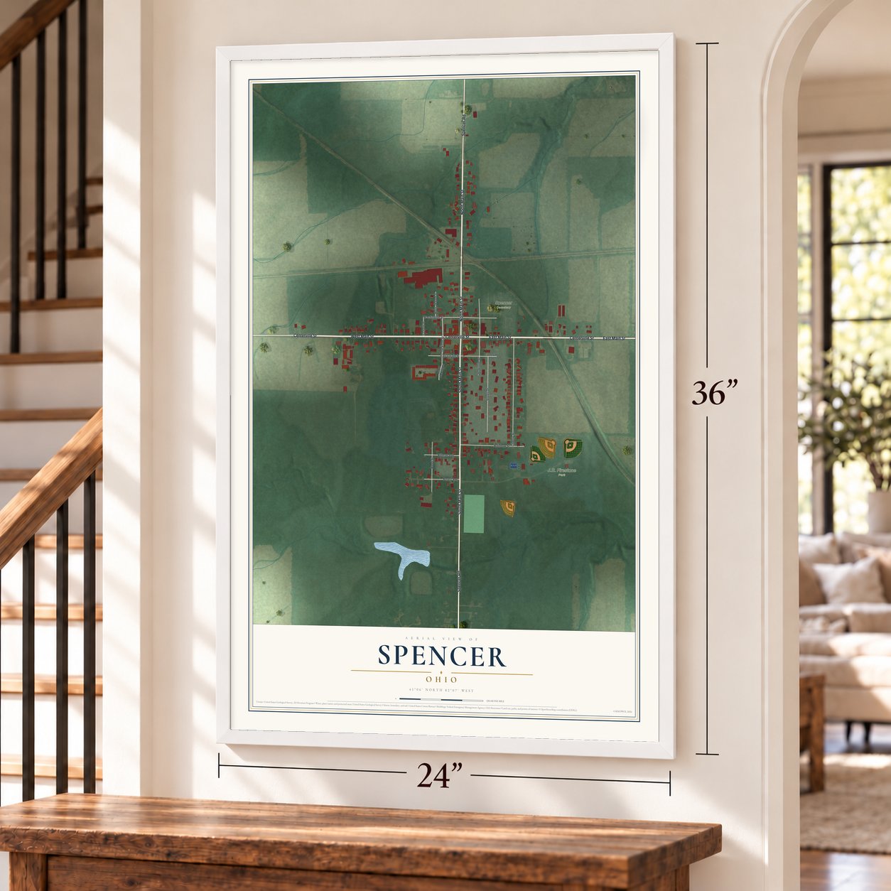 Spencer, Ohio map, 24 x 36 inch print in a white frame by a staircase