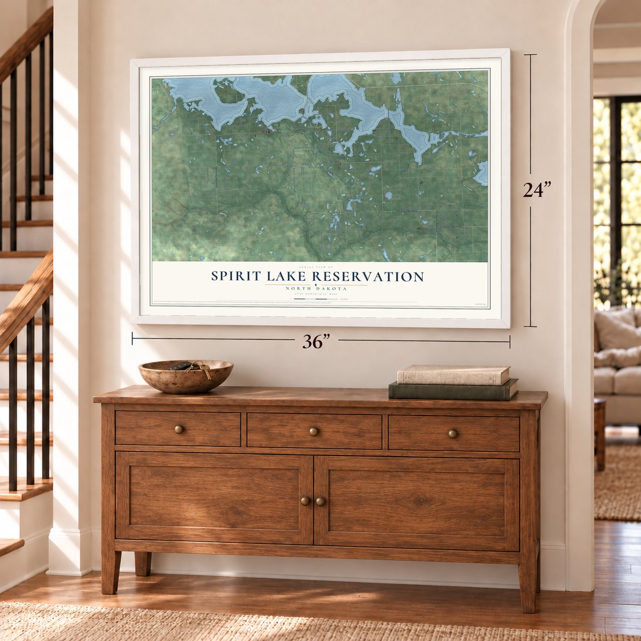 Spirit Lake Reservation, North Dakota map, 24 x 36 inch print in a white frame above a dresser by a staircase