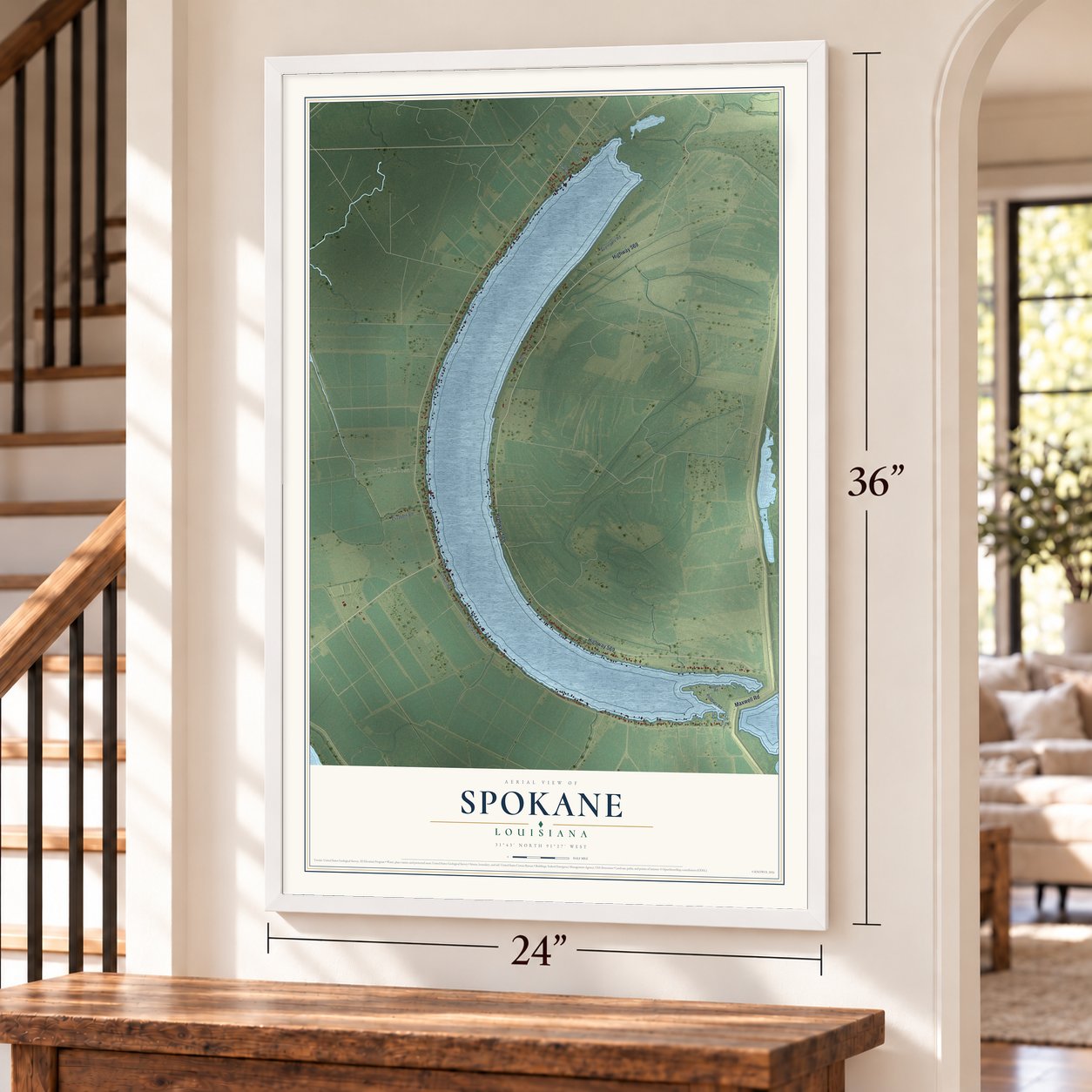 Spokane, Louisiana map, 24 x 36 inch print in a white frame by a staircase