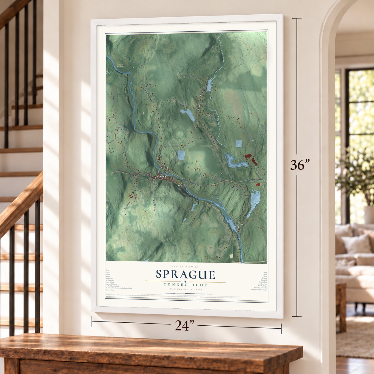 Sprague, Connecticut map, 24 x 36 inch print in a white frame by a staircase