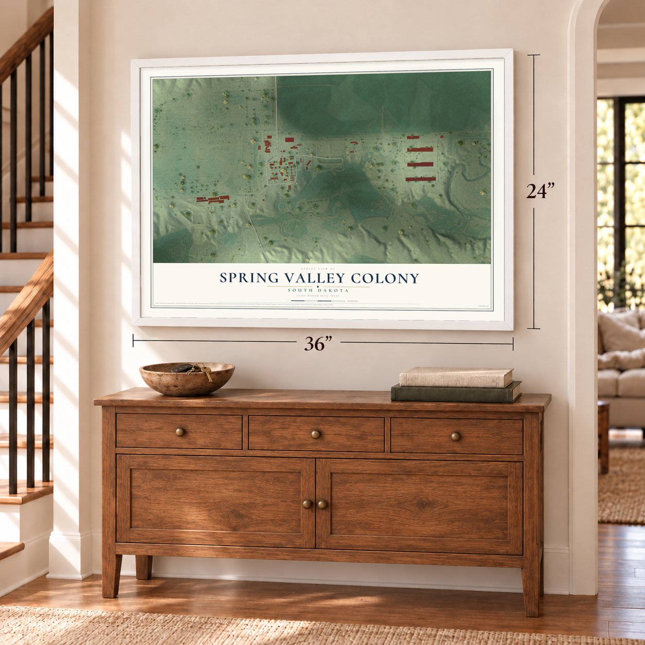 Spring Valley Colony, South Dakota map, 24 x 36 inch print in a white frame above a dresser by a staircase