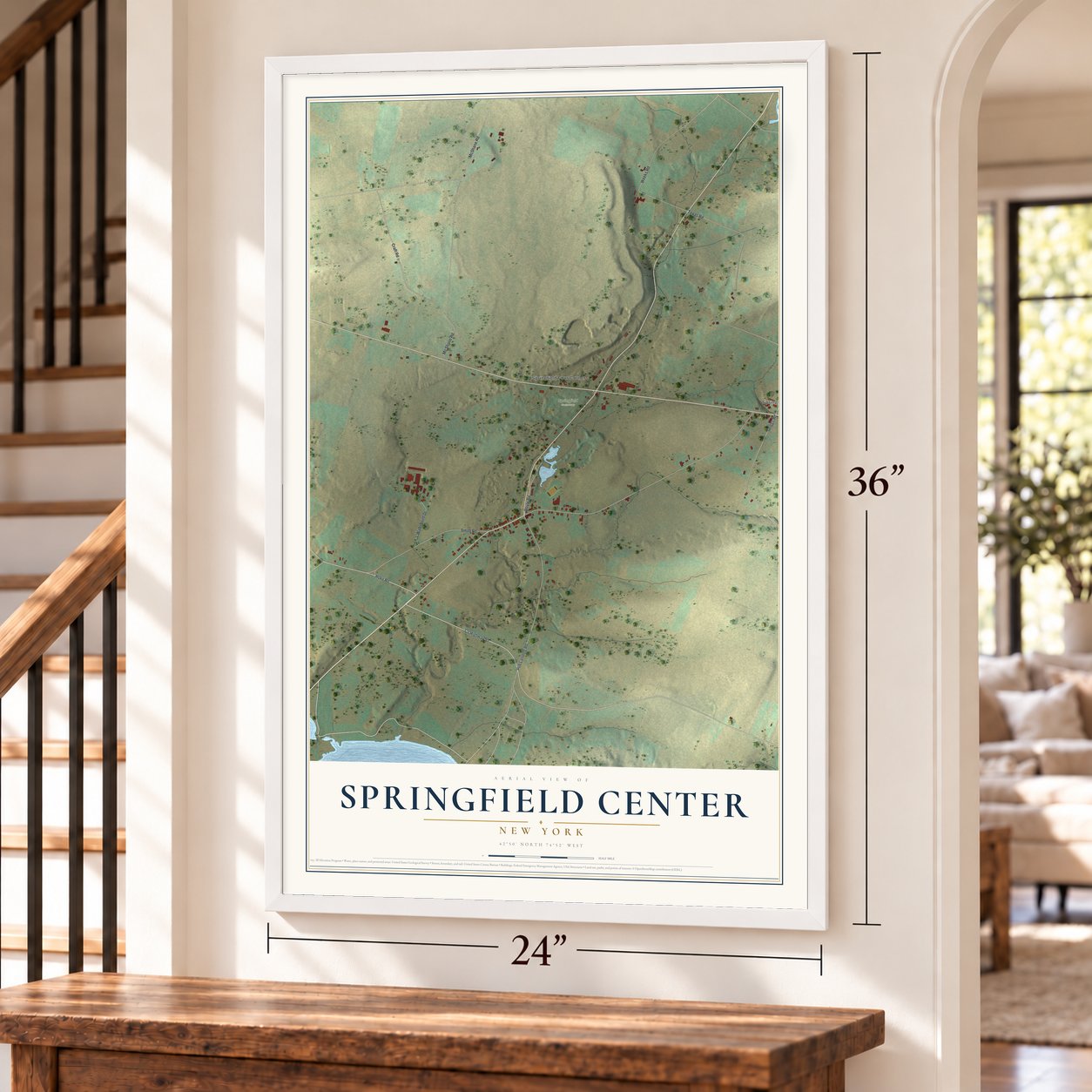 Springfield Center, New York map, 24 x 36 inch print in a white frame by a staircase