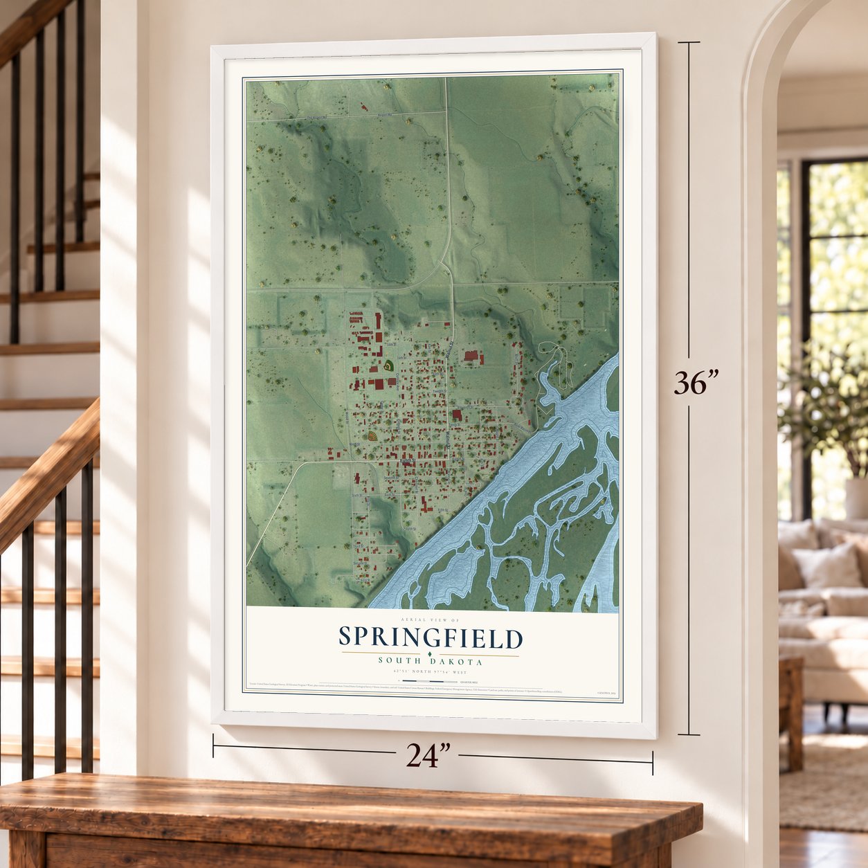 Springfield, South Dakota map, 24 x 36 inch print in a white frame by a staircase