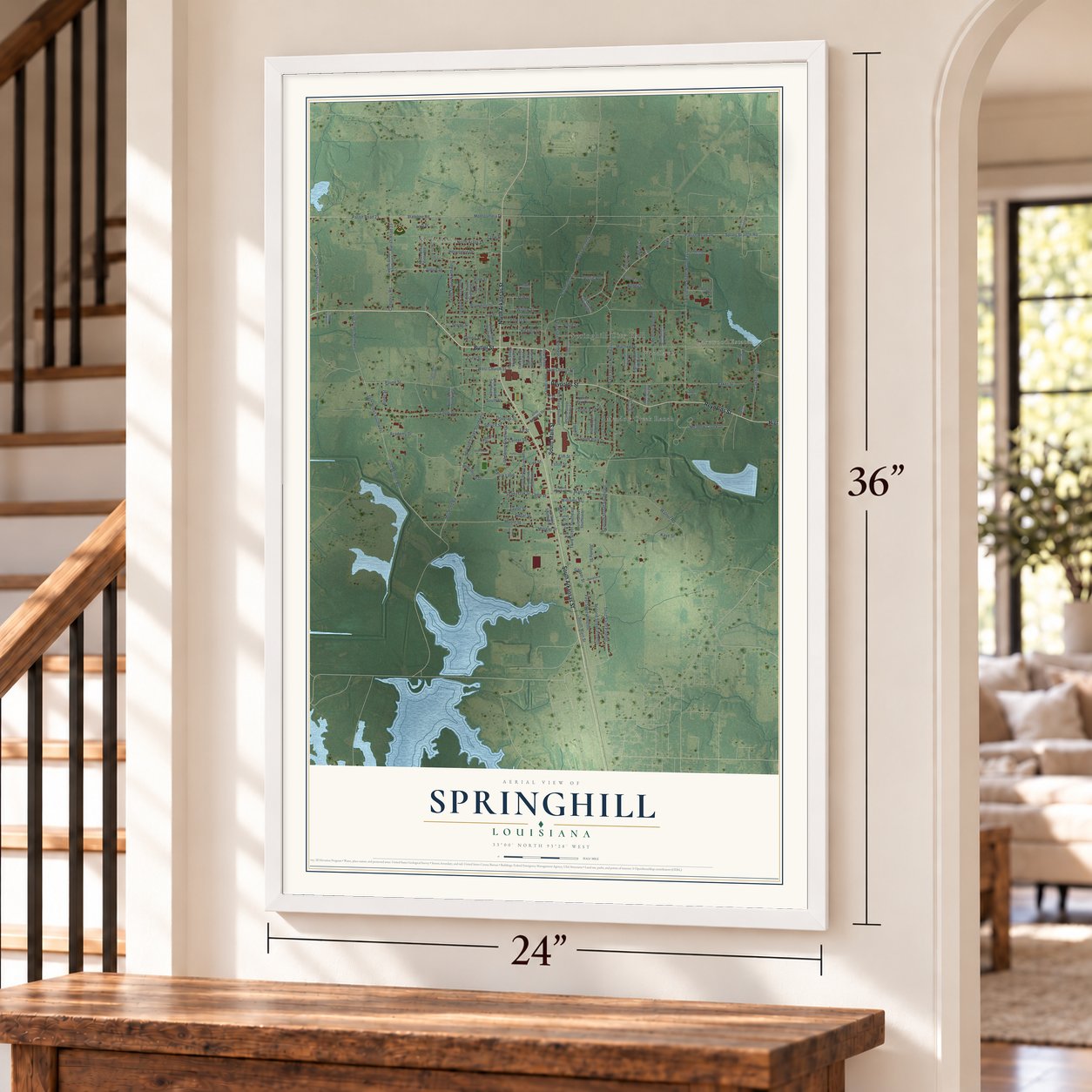 Springhill, Louisiana map, 24 x 36 inch print in a white frame by a staircase
