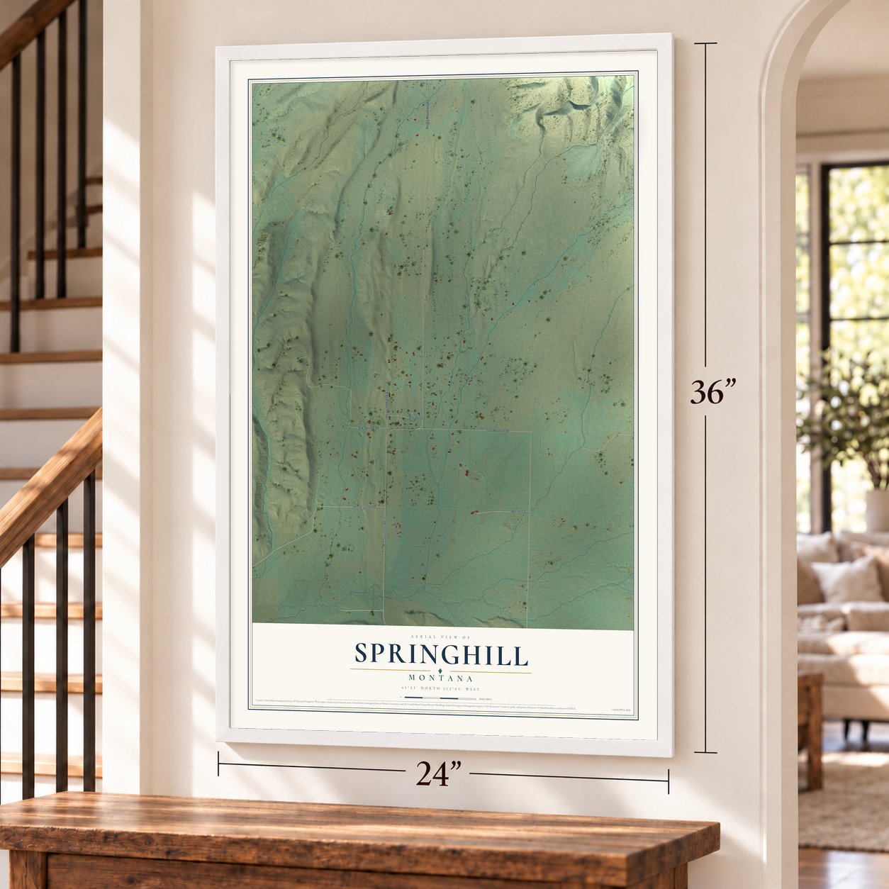 Springhill, Montana map, 24 x 36 inch print in a white frame by a staircase
