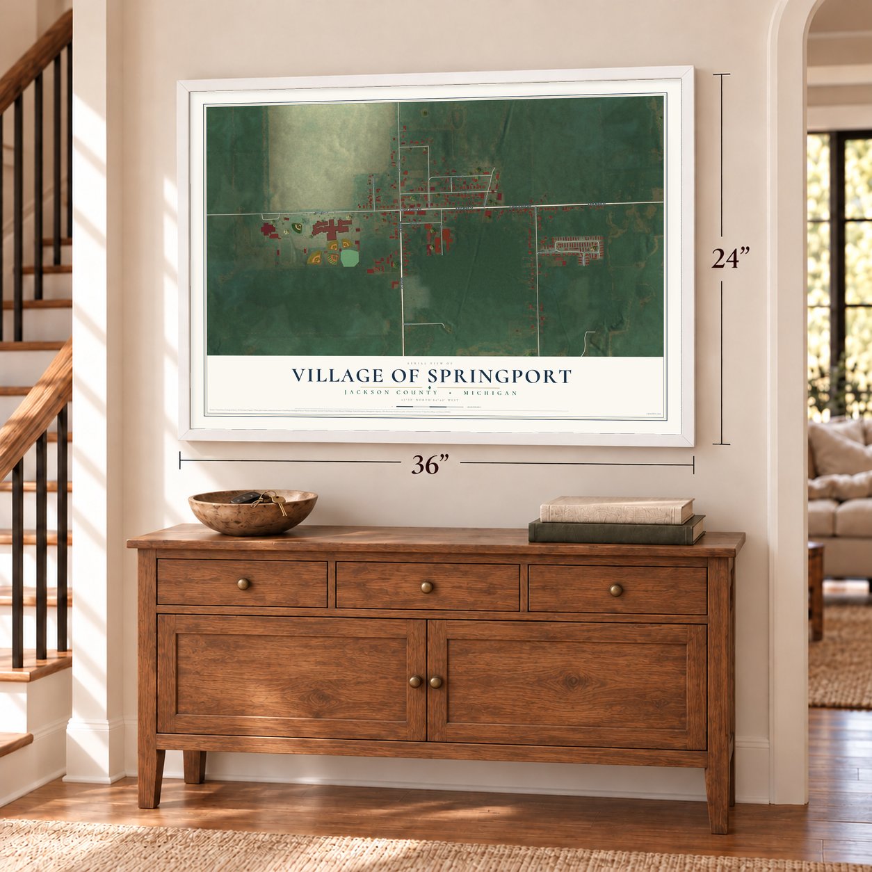 Springport, Michigan map, 24 x 36 inch print in a white frame above a dresser by a staircase