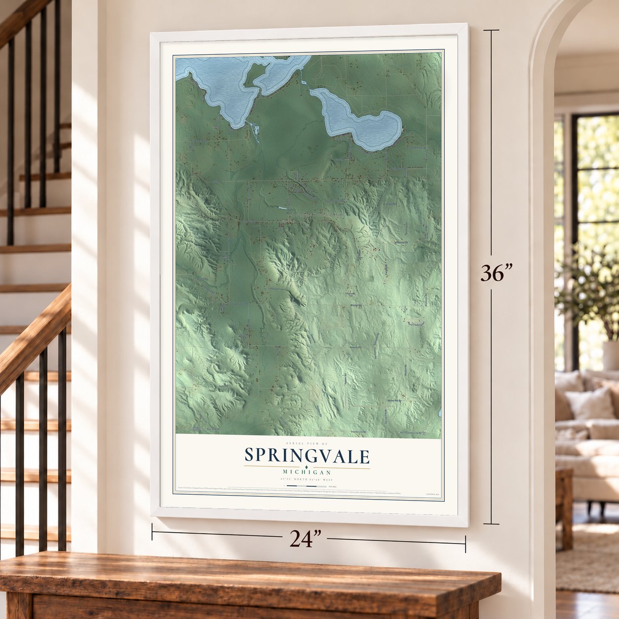 Springvale, Michigan map, 24 x 36 inch print in a white frame by a staircase