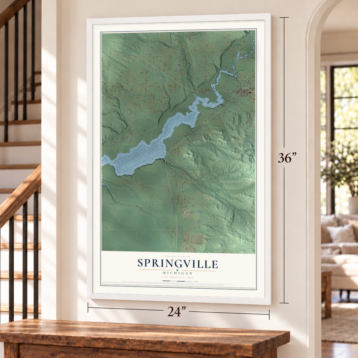 Springville, Michigan map, 24 x 36 inch print in a white frame by a staircase