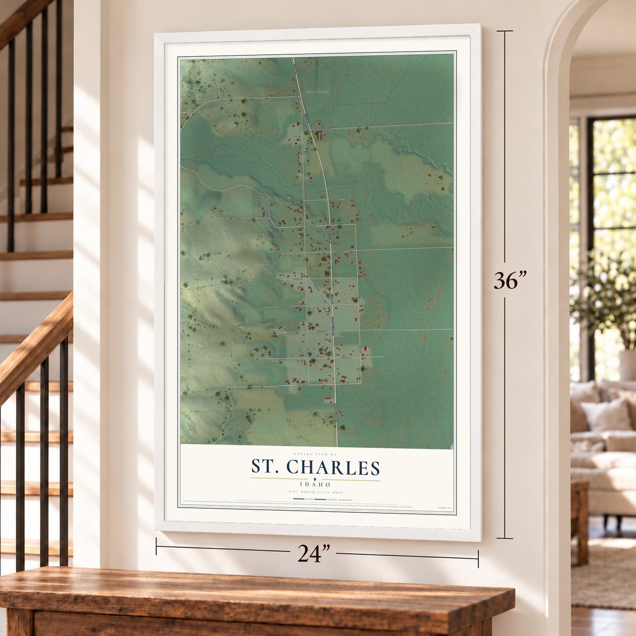 St. Charles, Idaho map, 24 x 36 inch print in a white frame by a staircase