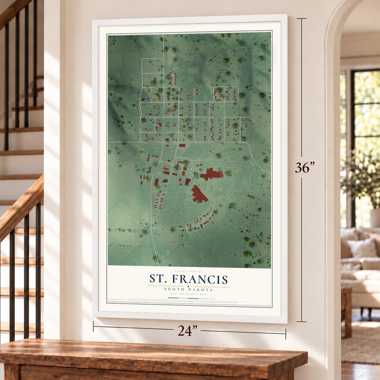 St. Francis, South Dakota map, 24 x 36 inch print in a white frame by a staircase