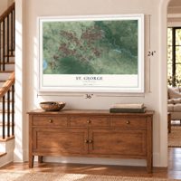 St. George, Louisiana map, 24 x 36 inch print in a white frame above a dresser by a staircase
