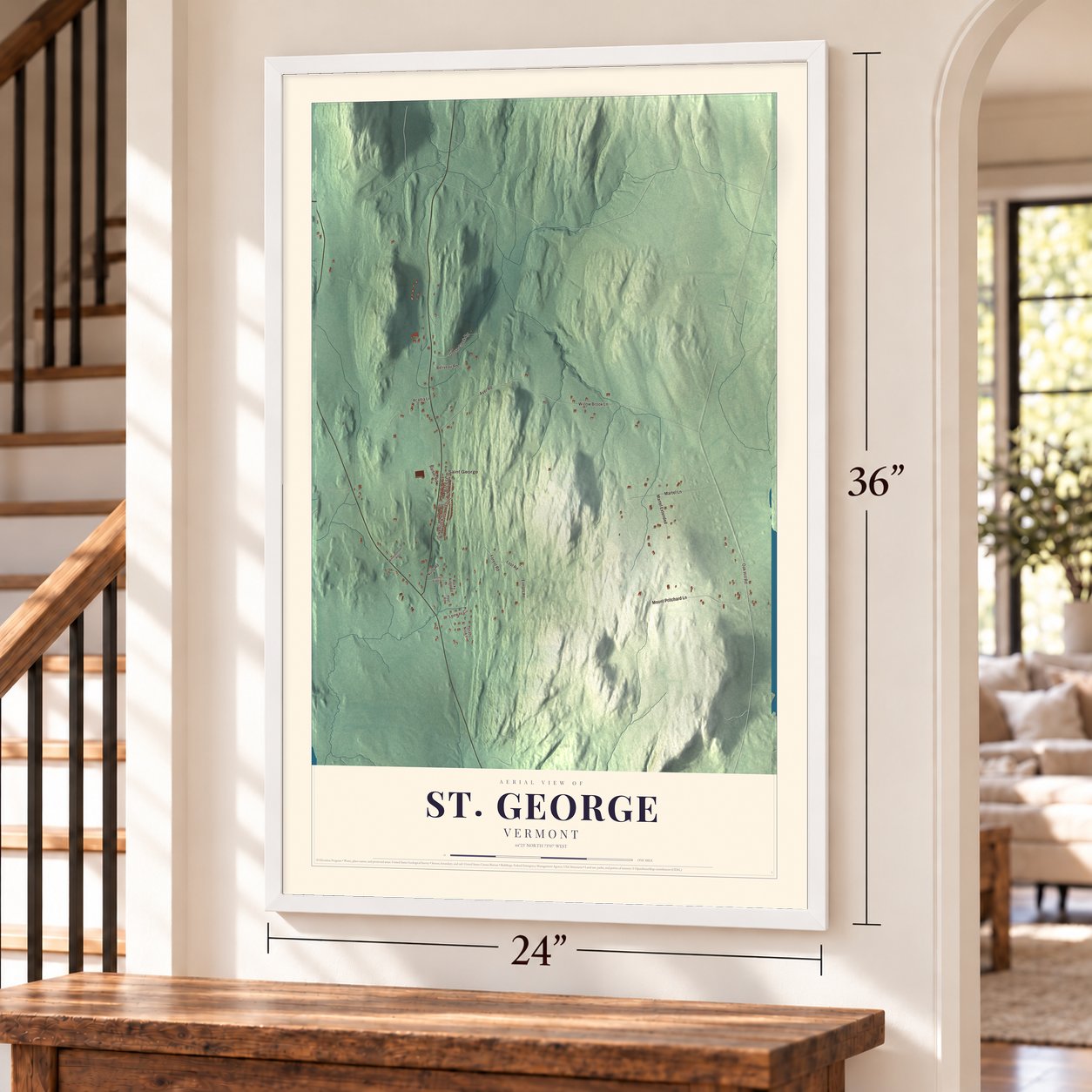 St. George, Vermont map, 24 x 36 inch print in a white frame by a staircase