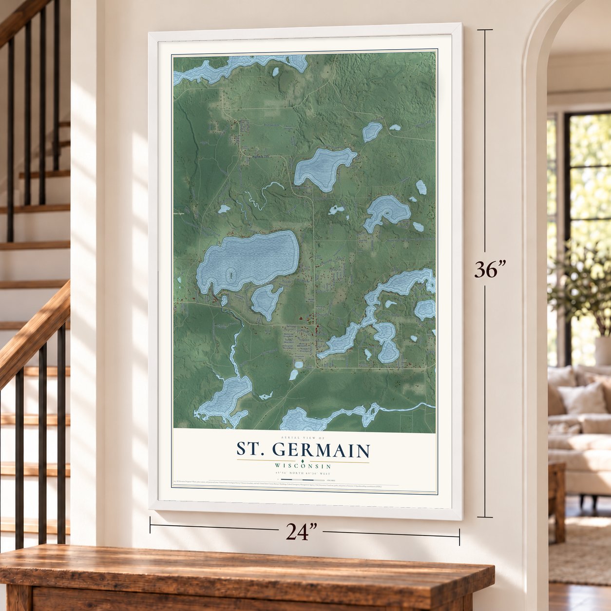 St. Germain, Wisconsin map, 24 x 36 inch print in a white frame by a staircase