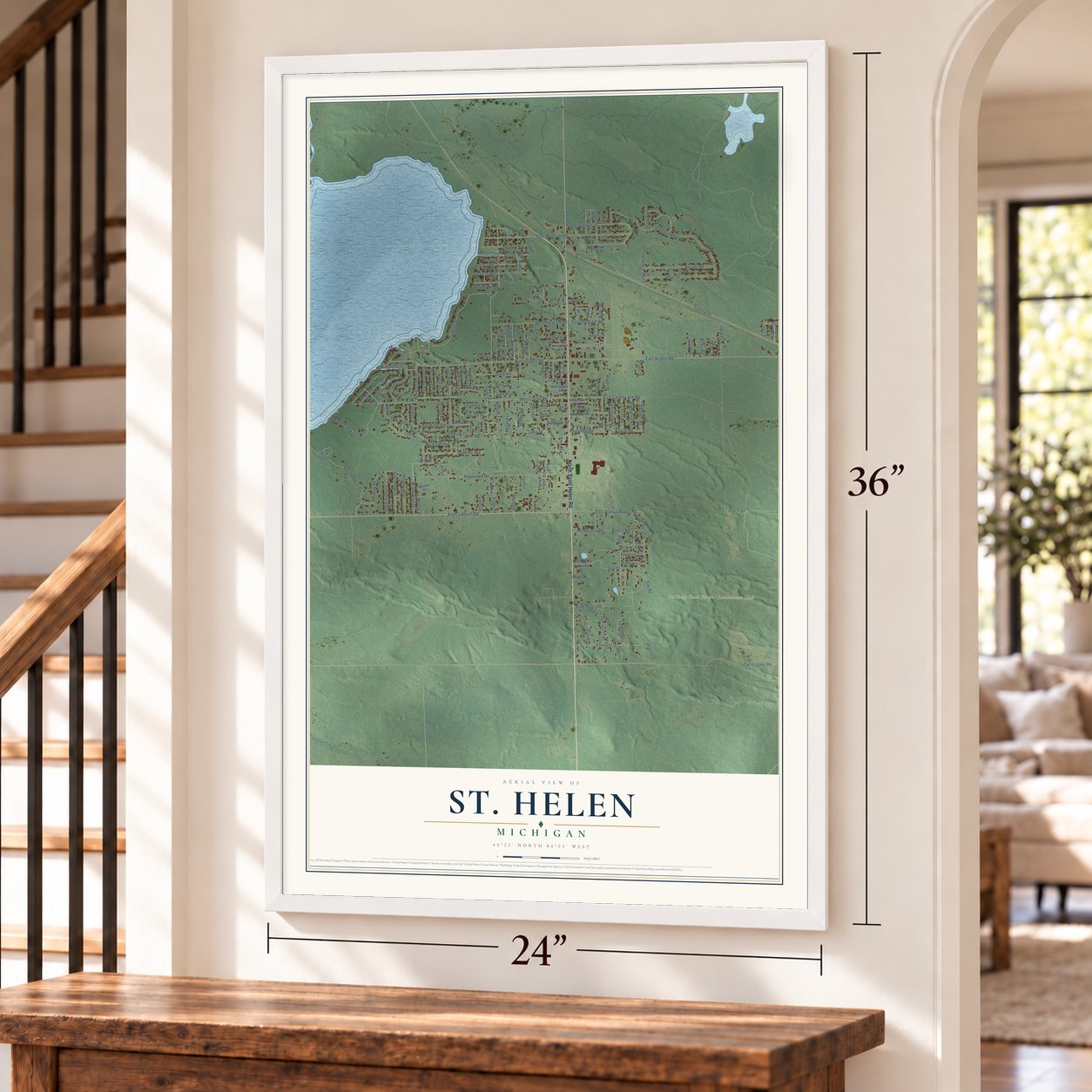 St. Helen, Michigan map, 24 x 36 inch print in a white frame by a staircase