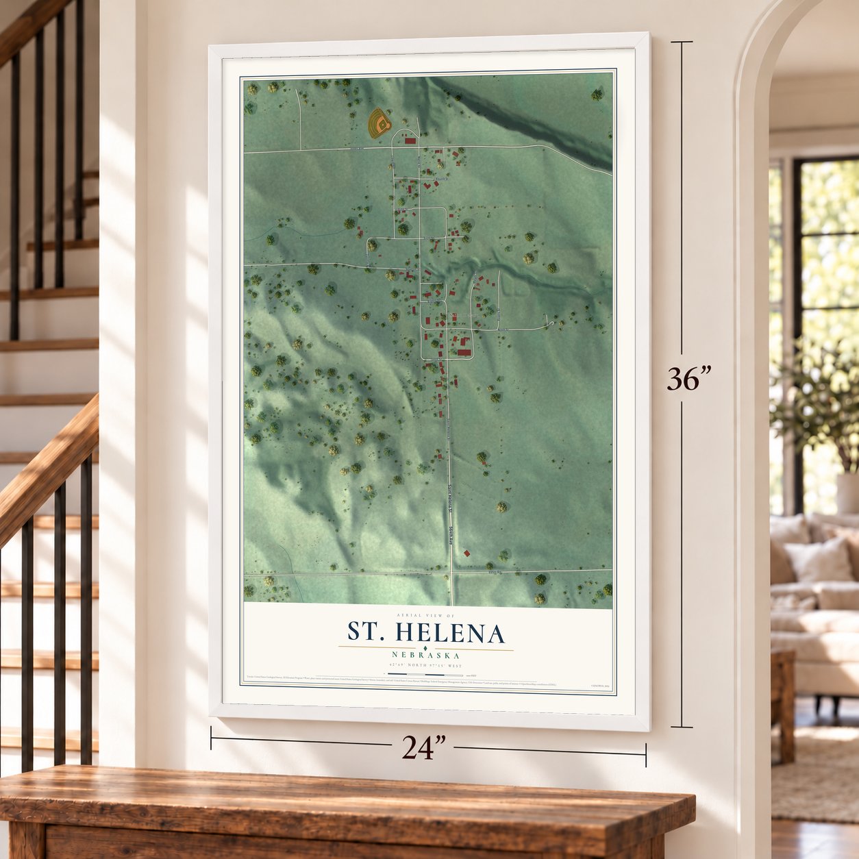St. Helena, Nebraska map, 24 x 36 inch print in a white frame by a staircase