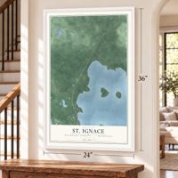 St. Ignace, Mackinac County, Michigan map, 24 x 36 inch print in a white frame by a staircase