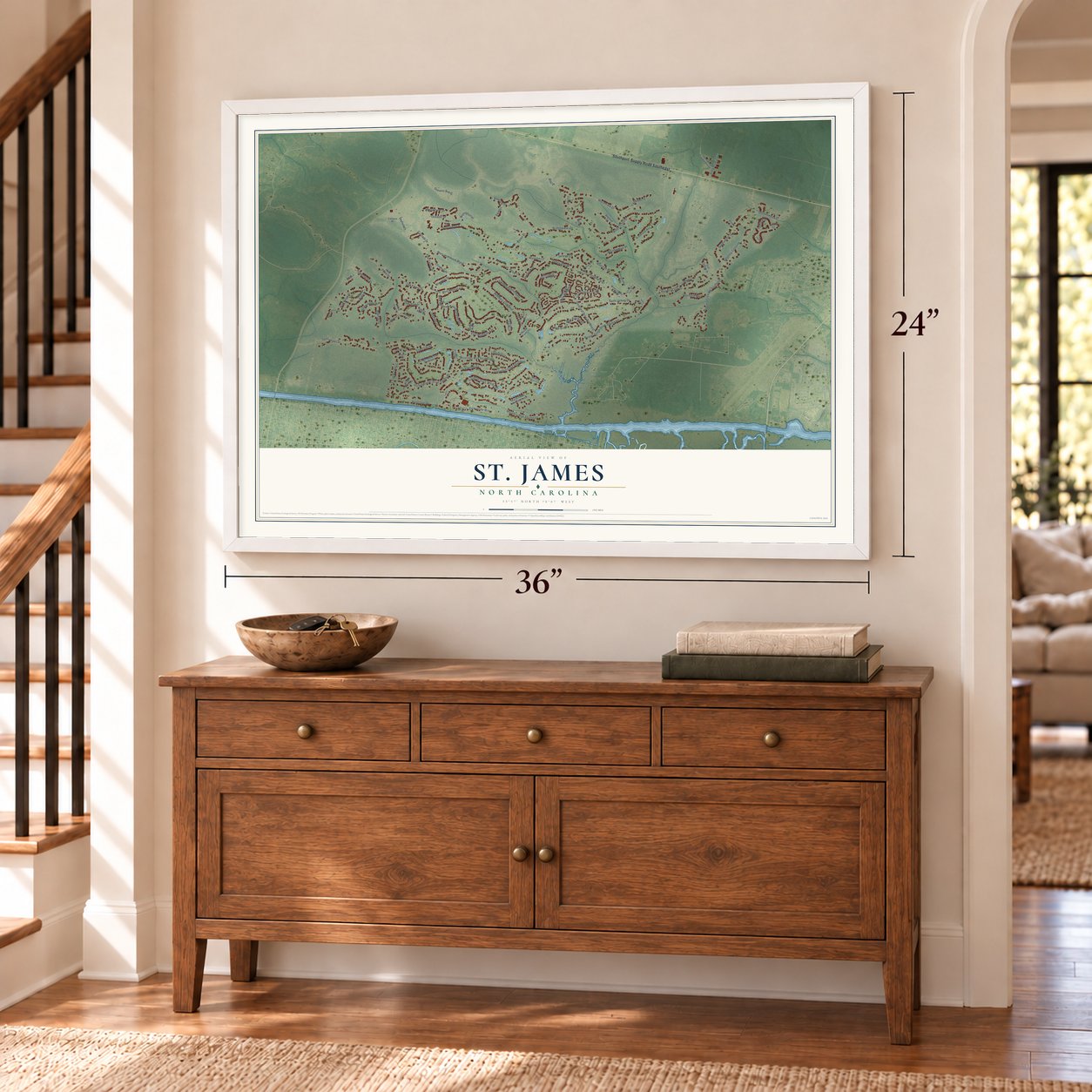 St. James, North Carolina map, 24 x 36 inch print in a white frame above a dresser by a staircase