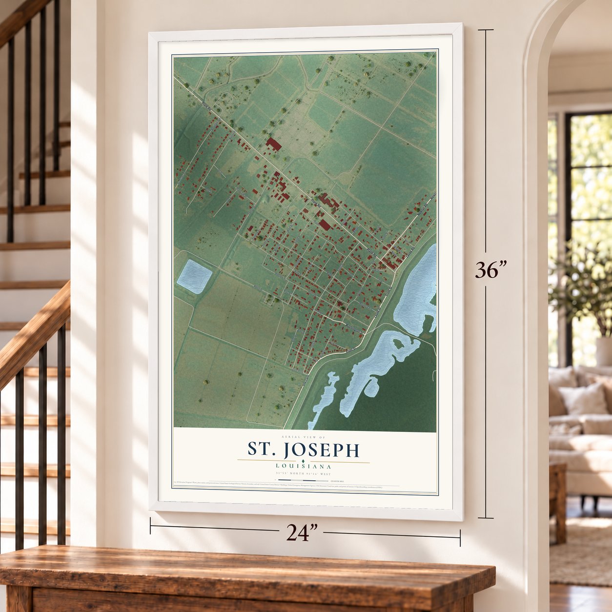 St. Joseph, Louisiana map, 24 x 36 inch print in a white frame by a staircase