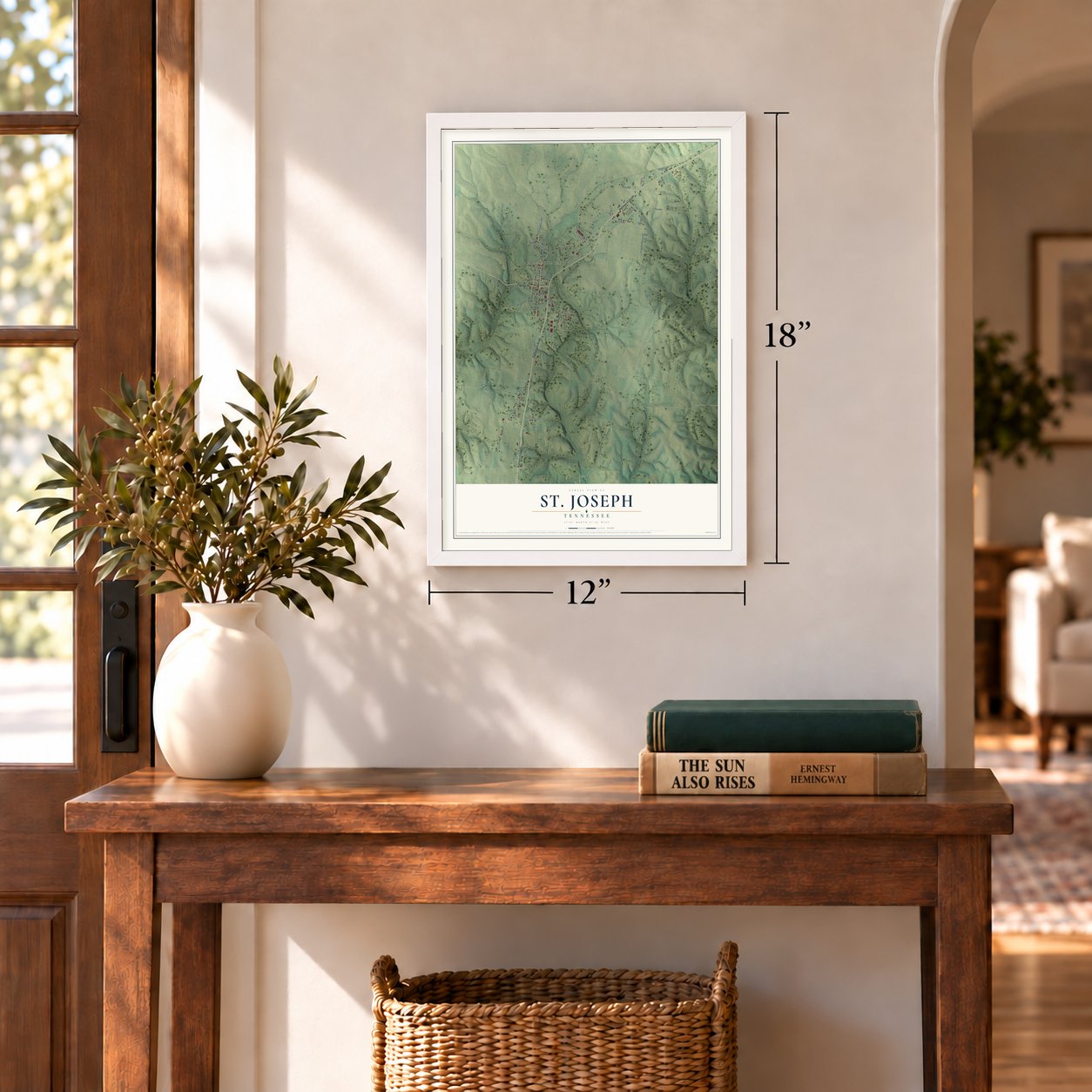 St. Joseph, Tennessee map, 12 x 18 inch print in a white frame in an entryway