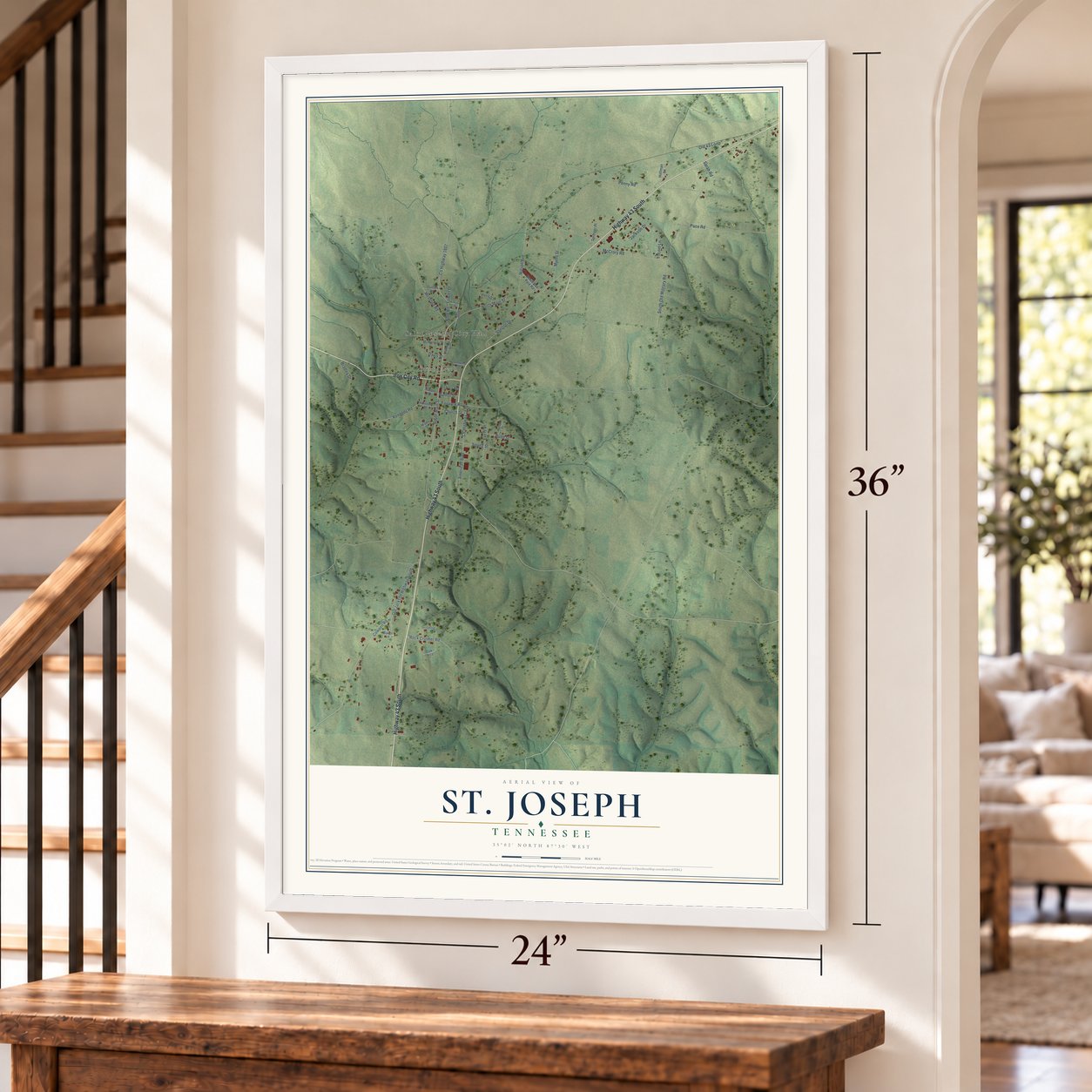 St. Joseph, Tennessee map, 24 x 36 inch print in a white frame by a staircase