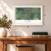 St. Louis, Michigan map, 12 x 18 inch print in a white frame in an entryway