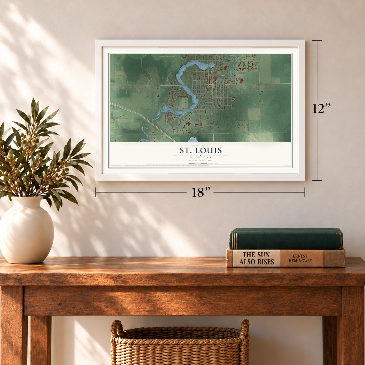 St. Louis, Michigan map, 12 x 18 inch print in a white frame in an entryway