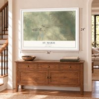 St. Marie, Montana map, 24 x 36 inch print in a white frame above a dresser by a staircase