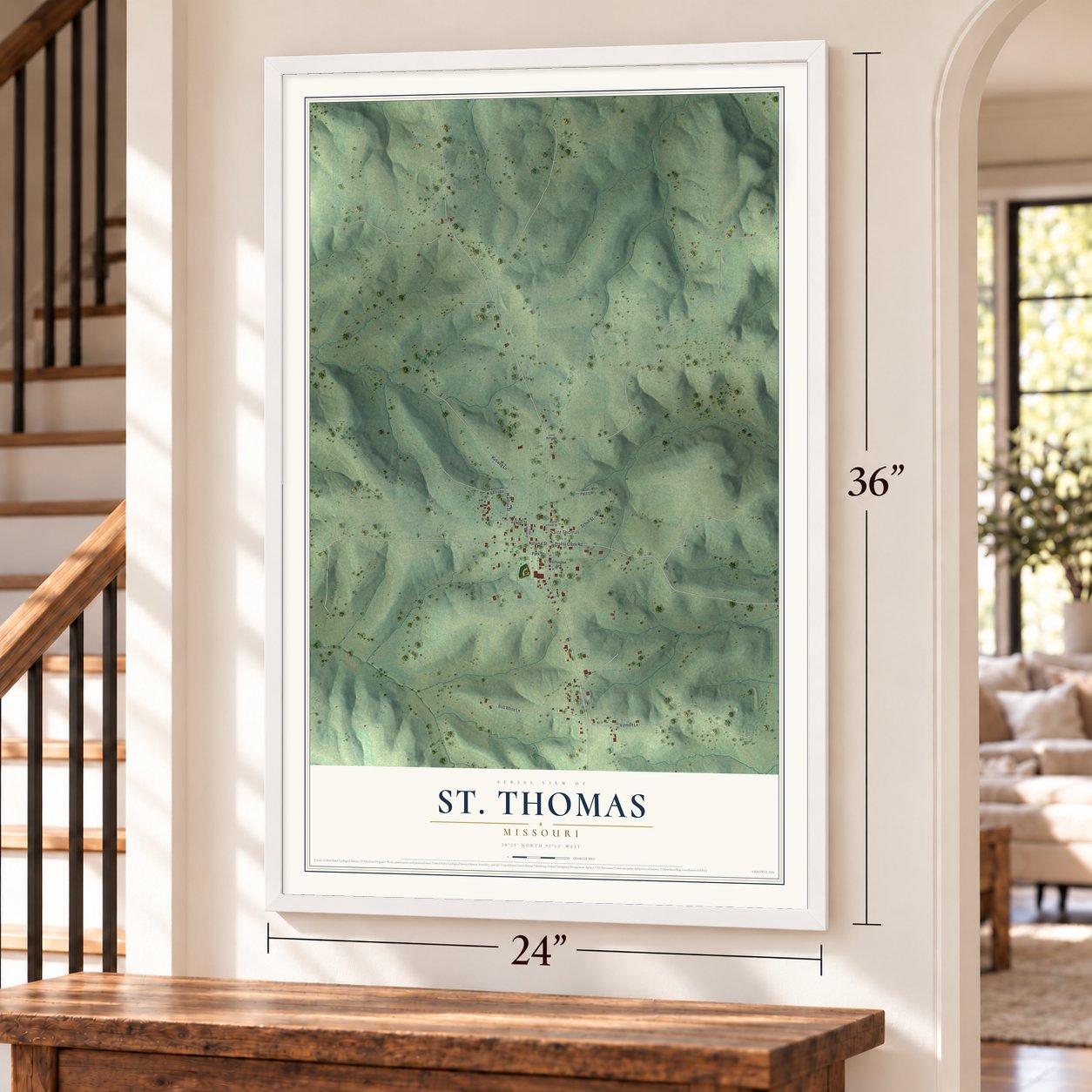 St. Thomas, Missouri map, 24 x 36 inch print in a white frame by a staircase