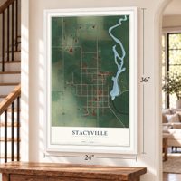 Stacyville, Iowa map, 24 x 36 inch print in a white frame by a staircase