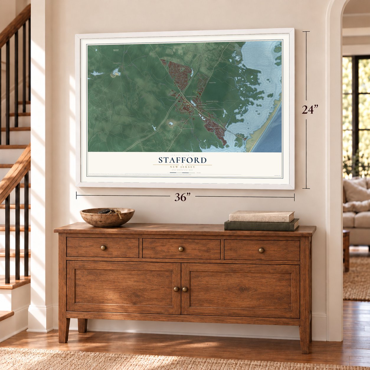 Stafford, New Jersey map, 24 x 36 inch print in a white frame above a dresser by a staircase