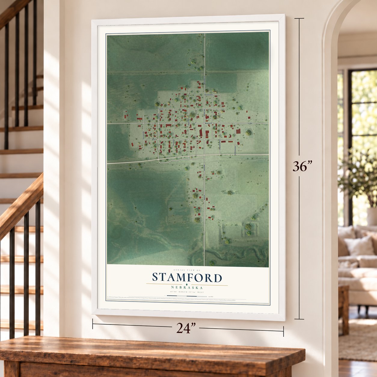 Stamford, Nebraska map, 24 x 36 inch print in a white frame by a staircase