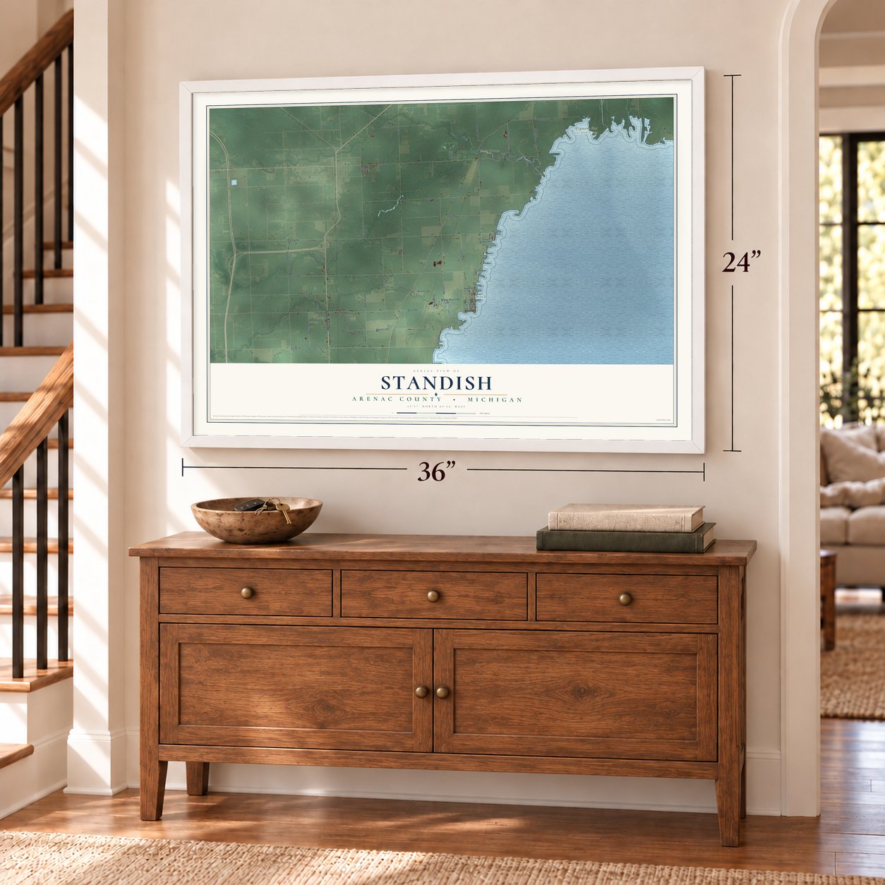 Standish, Arenac County, Michigan map, 24 x 36 inch print in a white frame above a dresser by a staircase