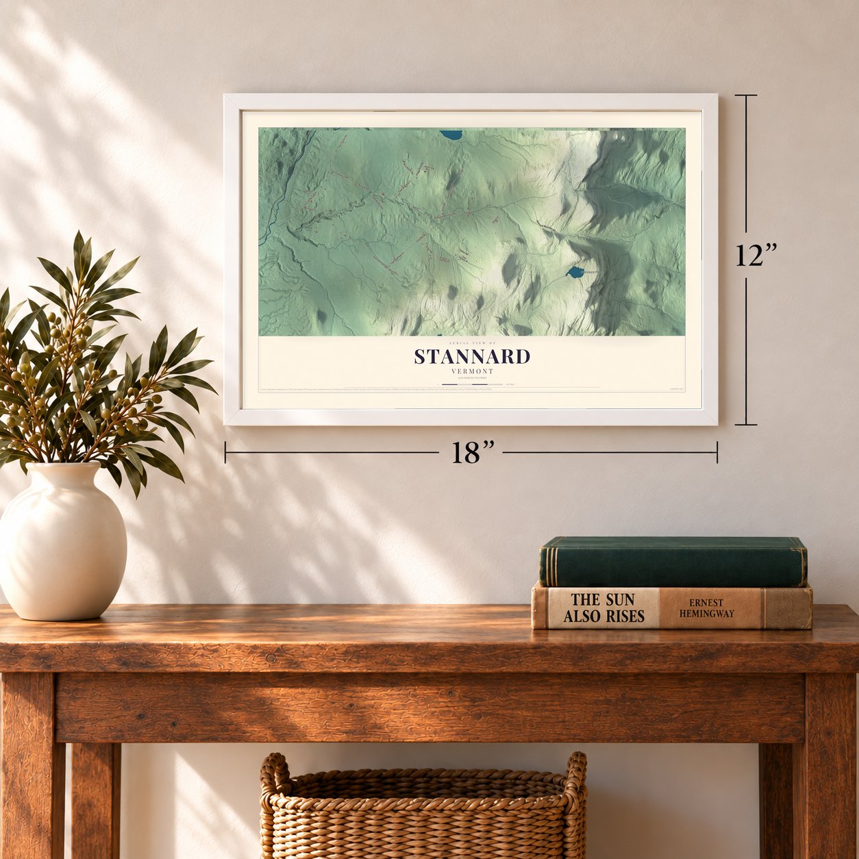 Stannard, Vermont map, 12 x 18 inch print in a white frame in an entryway