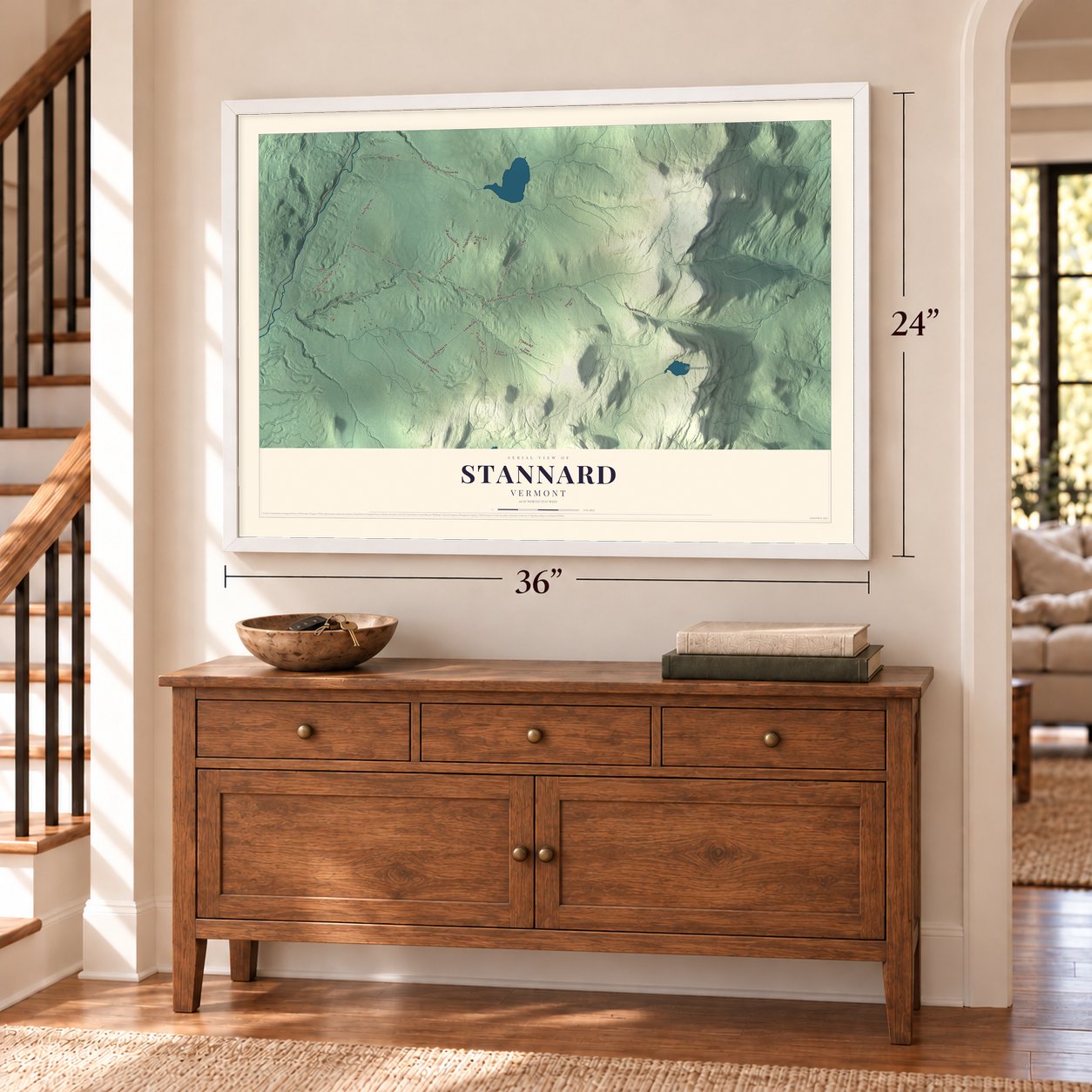 Stannard, Vermont map, 24 x 36 inch print in a white frame above a dresser by a staircase