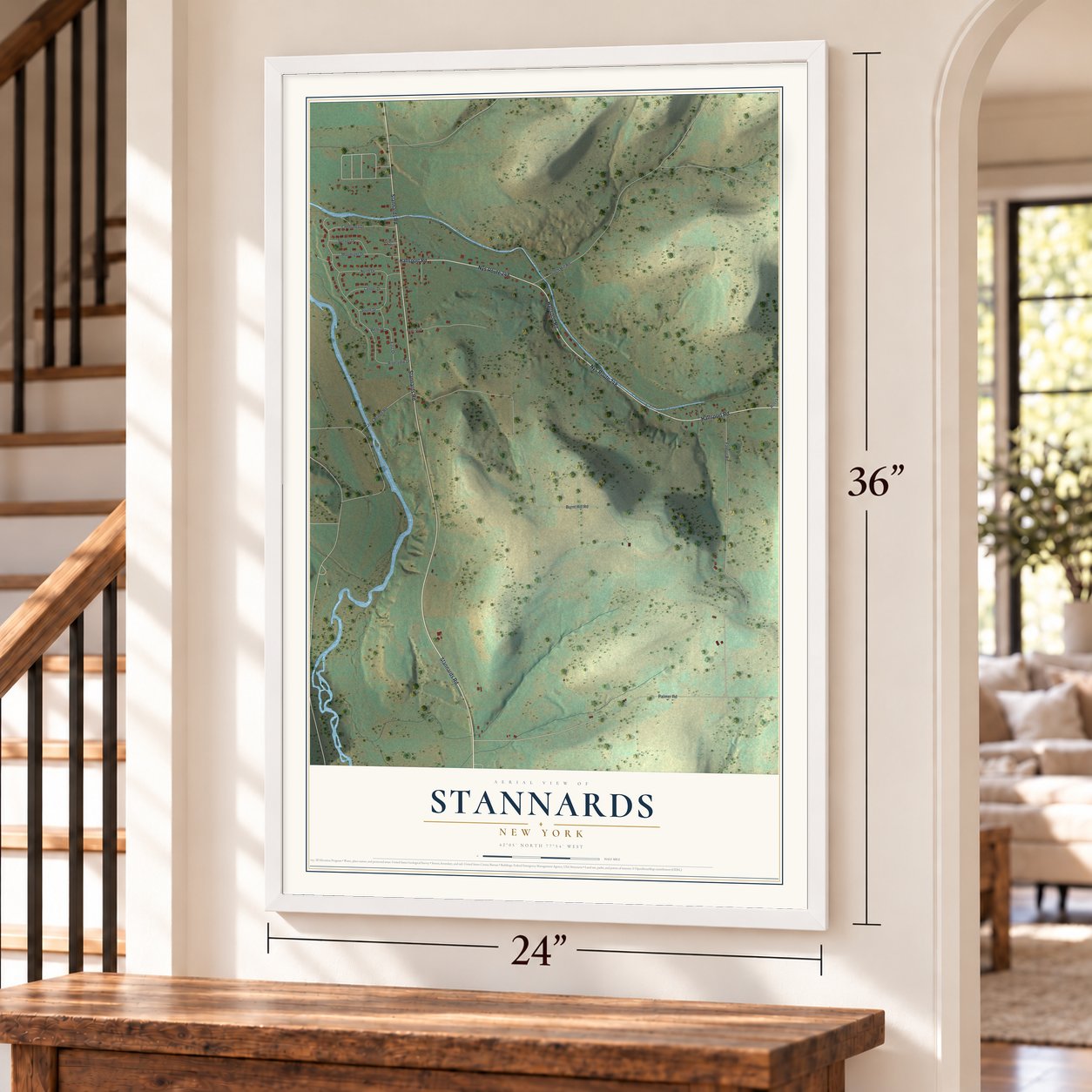 Stannards, New York map, 24 x 36 inch print in a white frame by a staircase