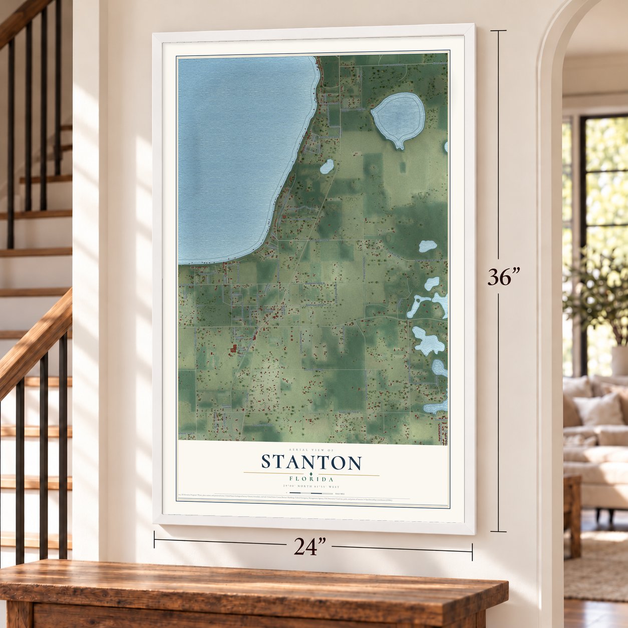 Stanton, Florida map, 24 x 36 inch print in a white frame by a staircase