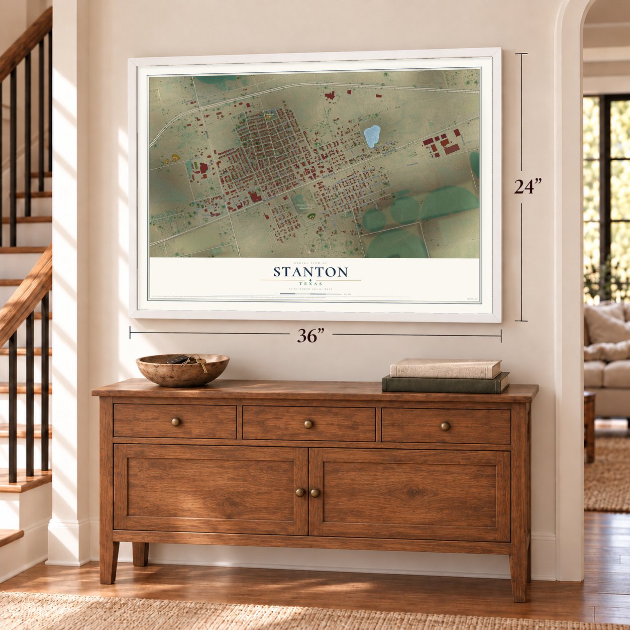 Stanton, Texas map, 24 x 36 inch print in a white frame above a dresser by a staircase