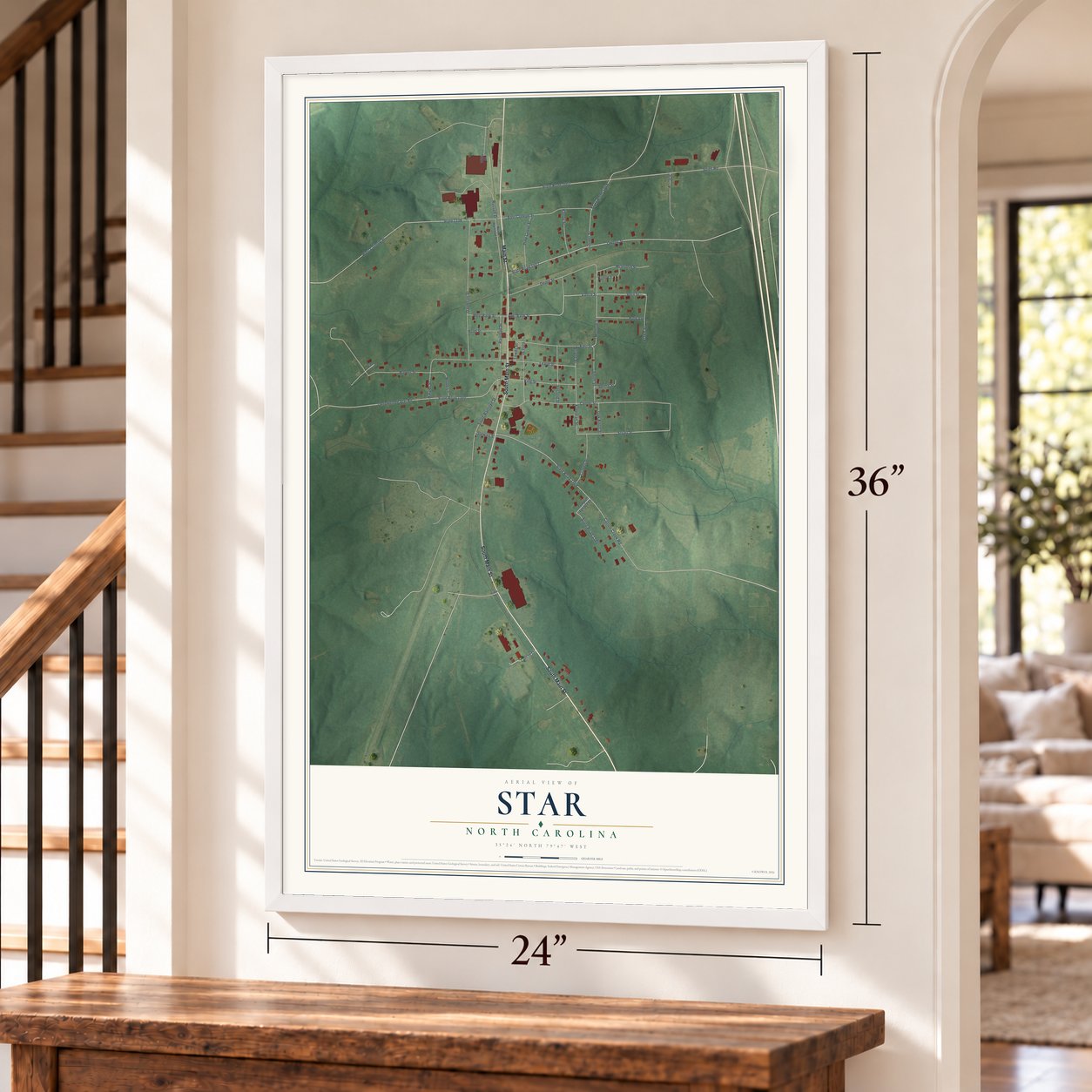 Star, North Carolina map, 24 x 36 inch print in a white frame by a staircase