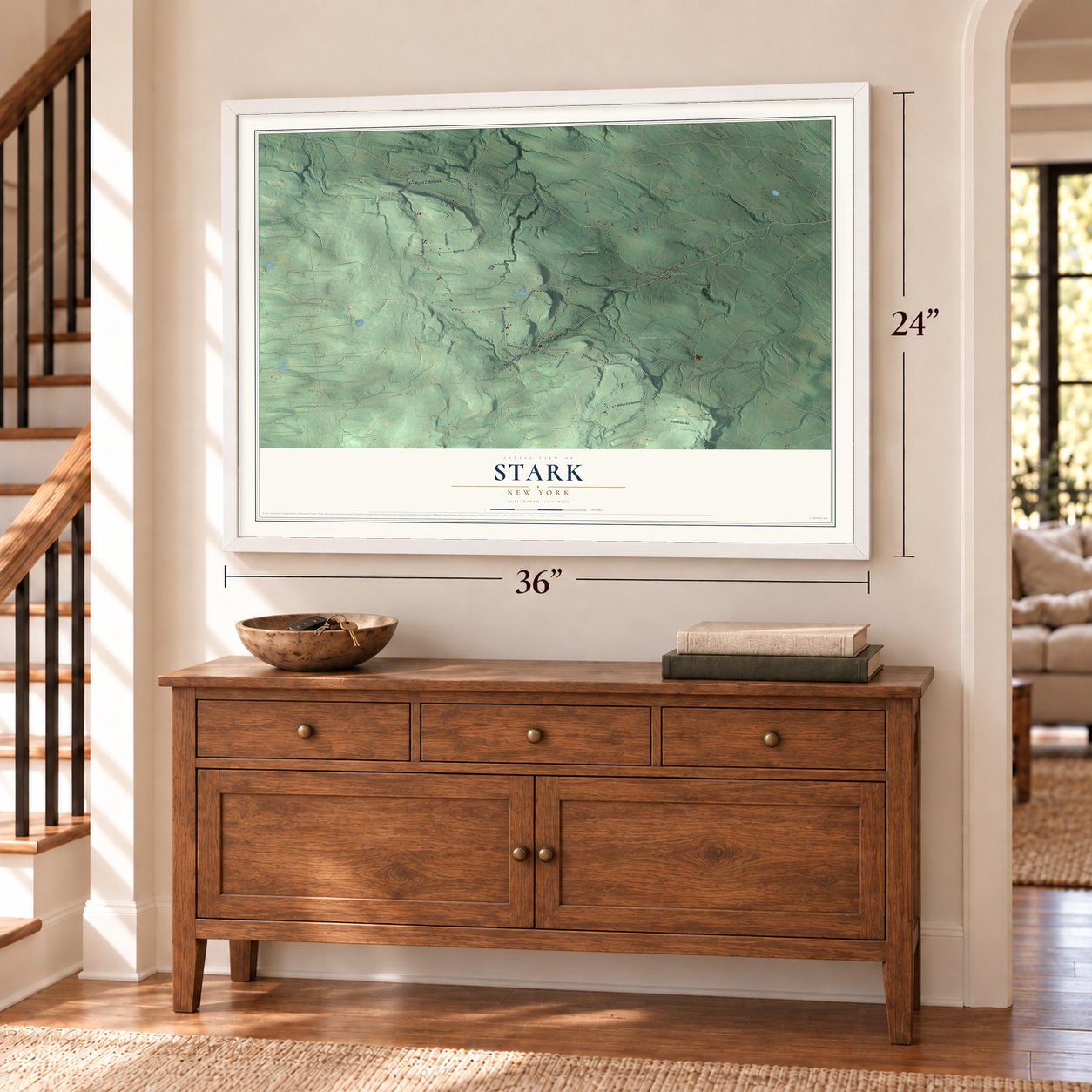 Stark, New York map, 24 x 36 inch print in a white frame above a dresser by a staircase