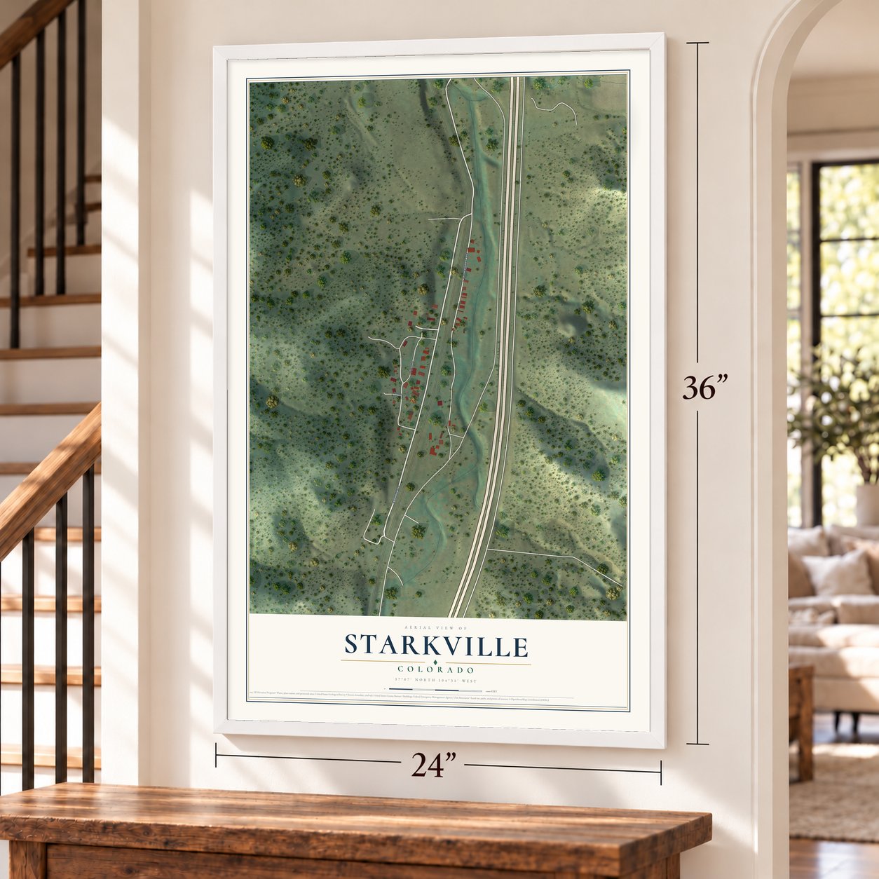 Starkville, Colorado map, 24 x 36 inch print in a white frame by a staircase