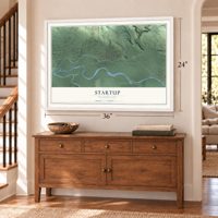 Startup, Washington map, 24 x 36 inch print in a white frame above a dresser by a staircase