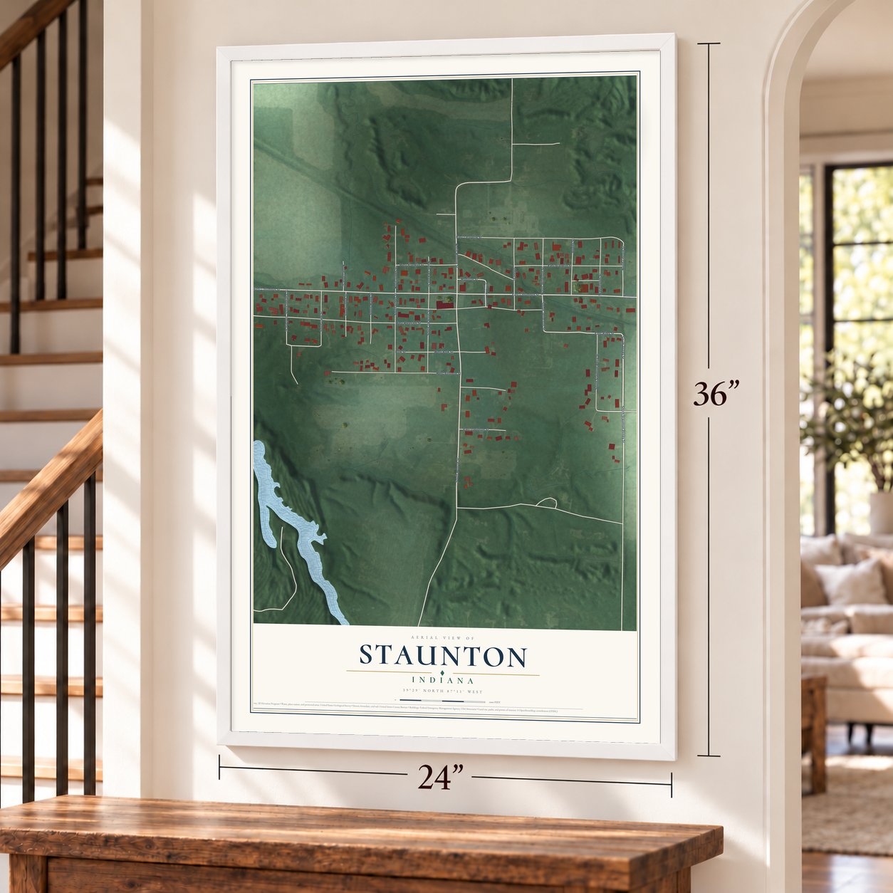 Staunton, Indiana map, 24 x 36 inch print in a white frame by a staircase