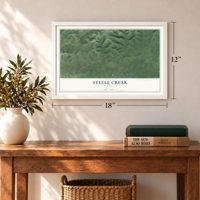 Steele Creek, Alaska map, 12 x 18 inch print in a white frame in an entryway