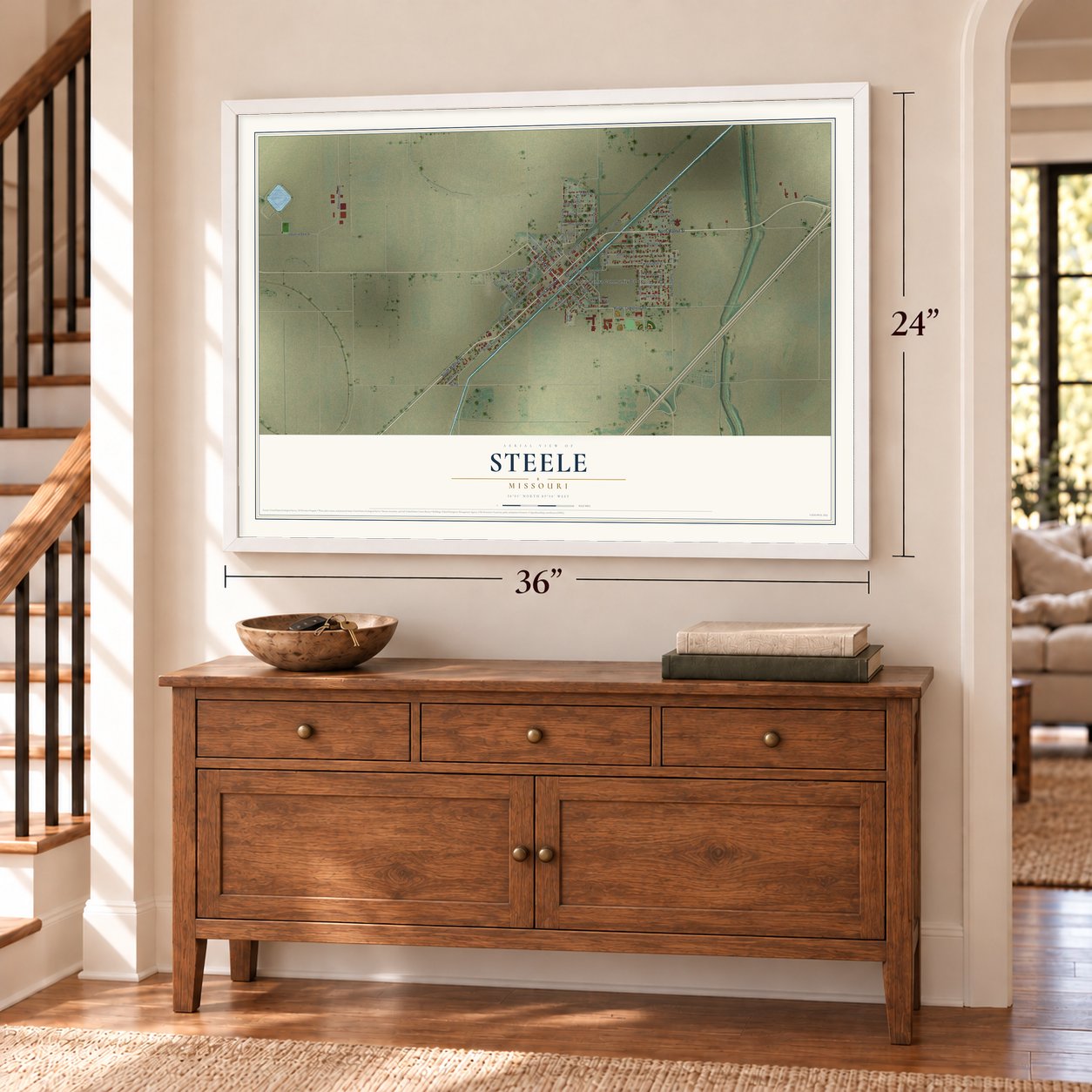 Steele, Missouri map, 24 x 36 inch print in a white frame above a dresser by a staircase