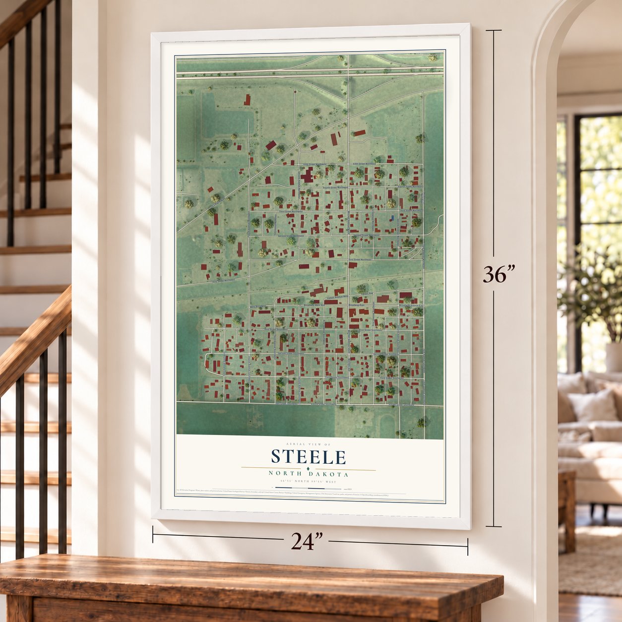 Steele, North Dakota map, 24 x 36 inch print in a white frame by a staircase