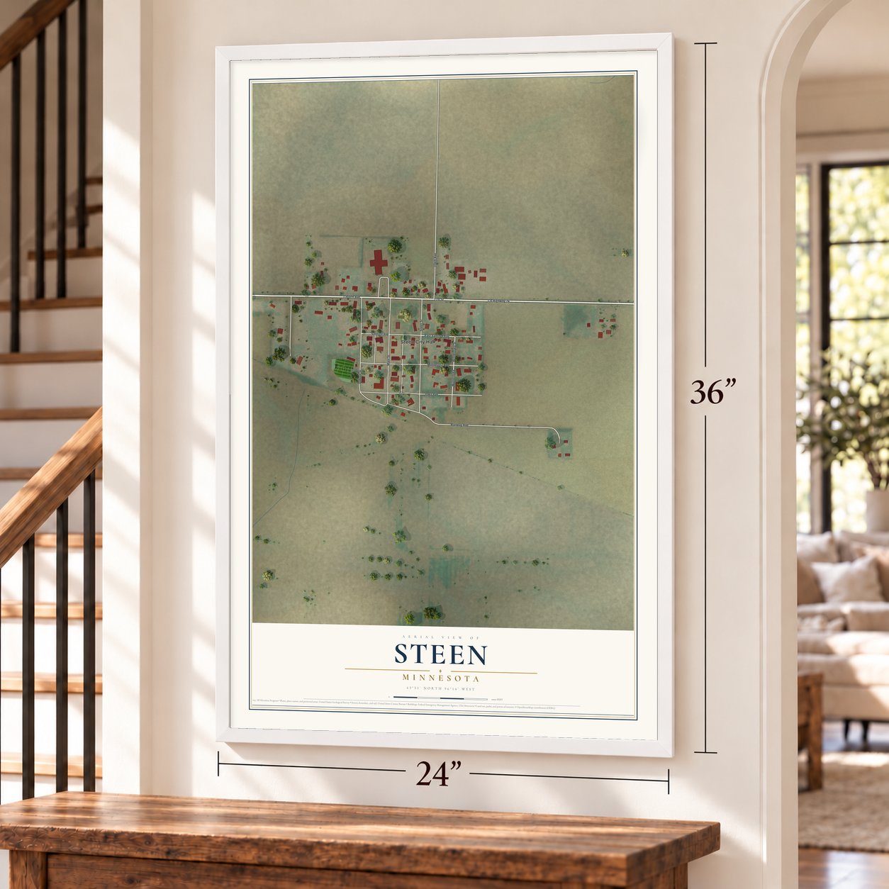 Steen, Minnesota map, 24 x 36 inch print in a white frame by a staircase