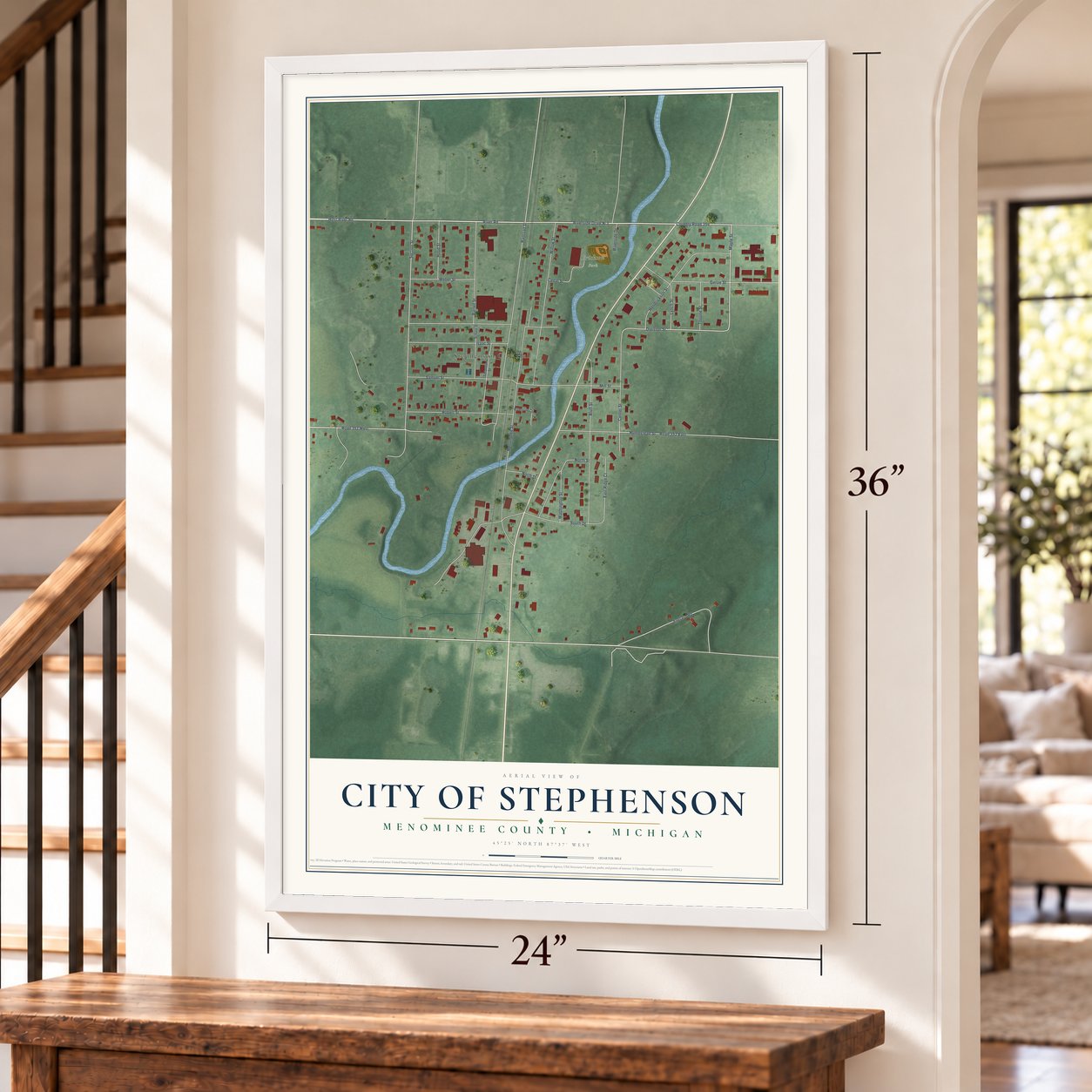 Stephenson, Michigan map, 24 x 36 inch print in a white frame by a staircase